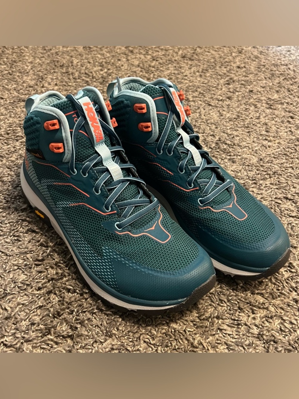 Hoka Teal Women’s Trail Boots with Coral Accents